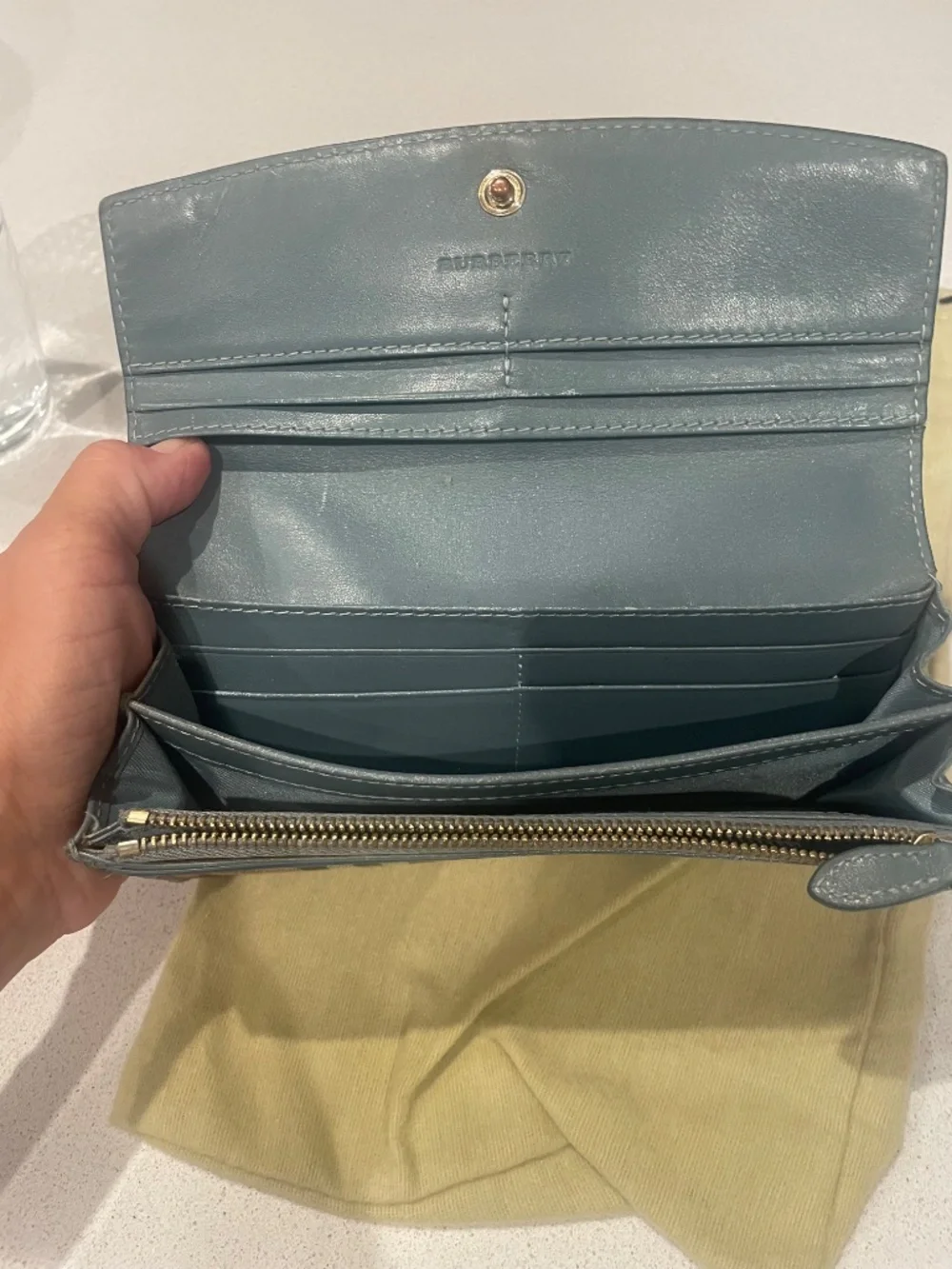 Burberry leather printed continental wallet with blue flap